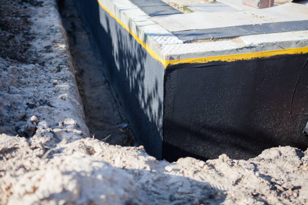 Professional Emergency Waterproofing technician working in Greens Fork, IN